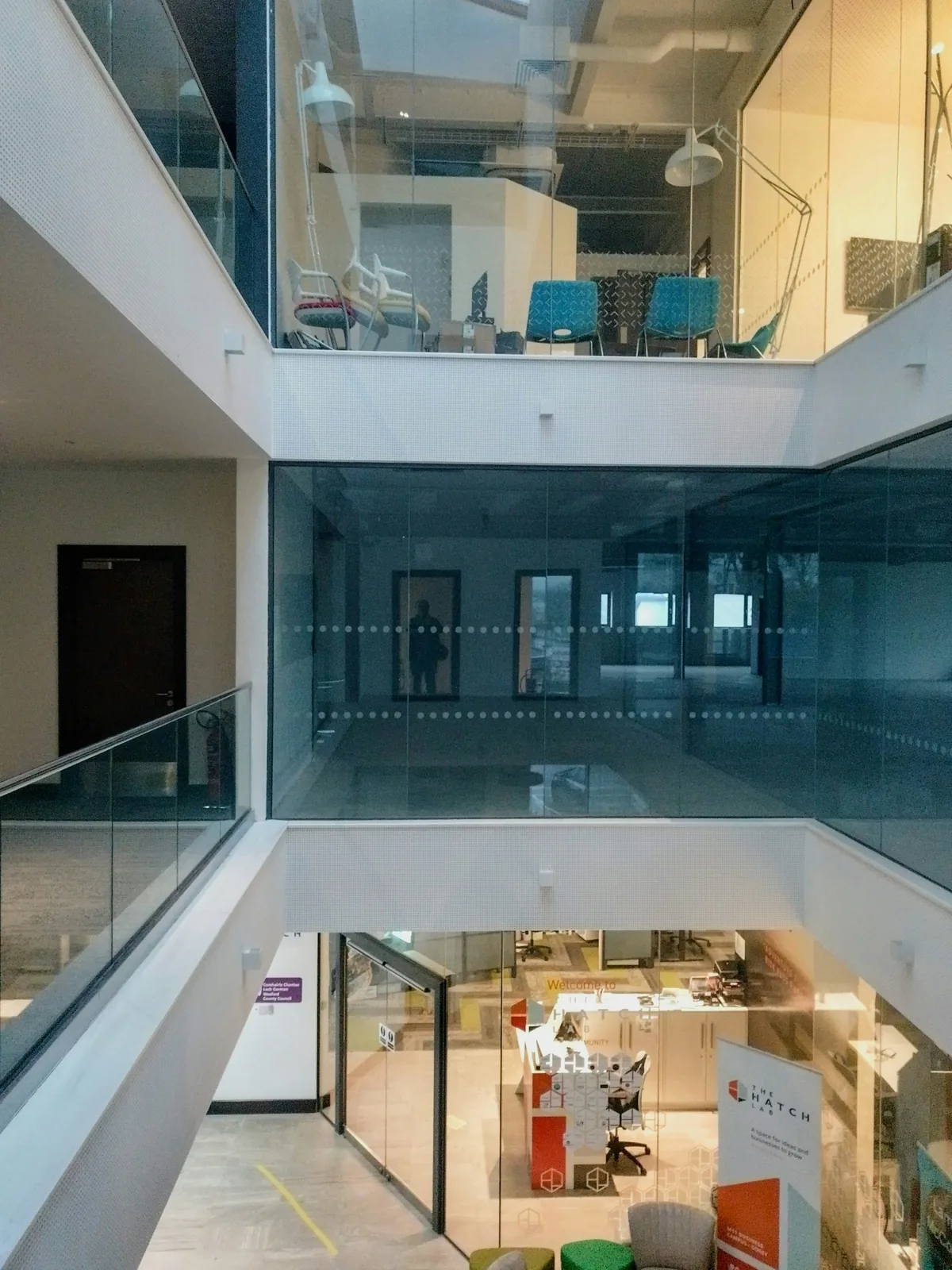 Modern office interior with glass walkways